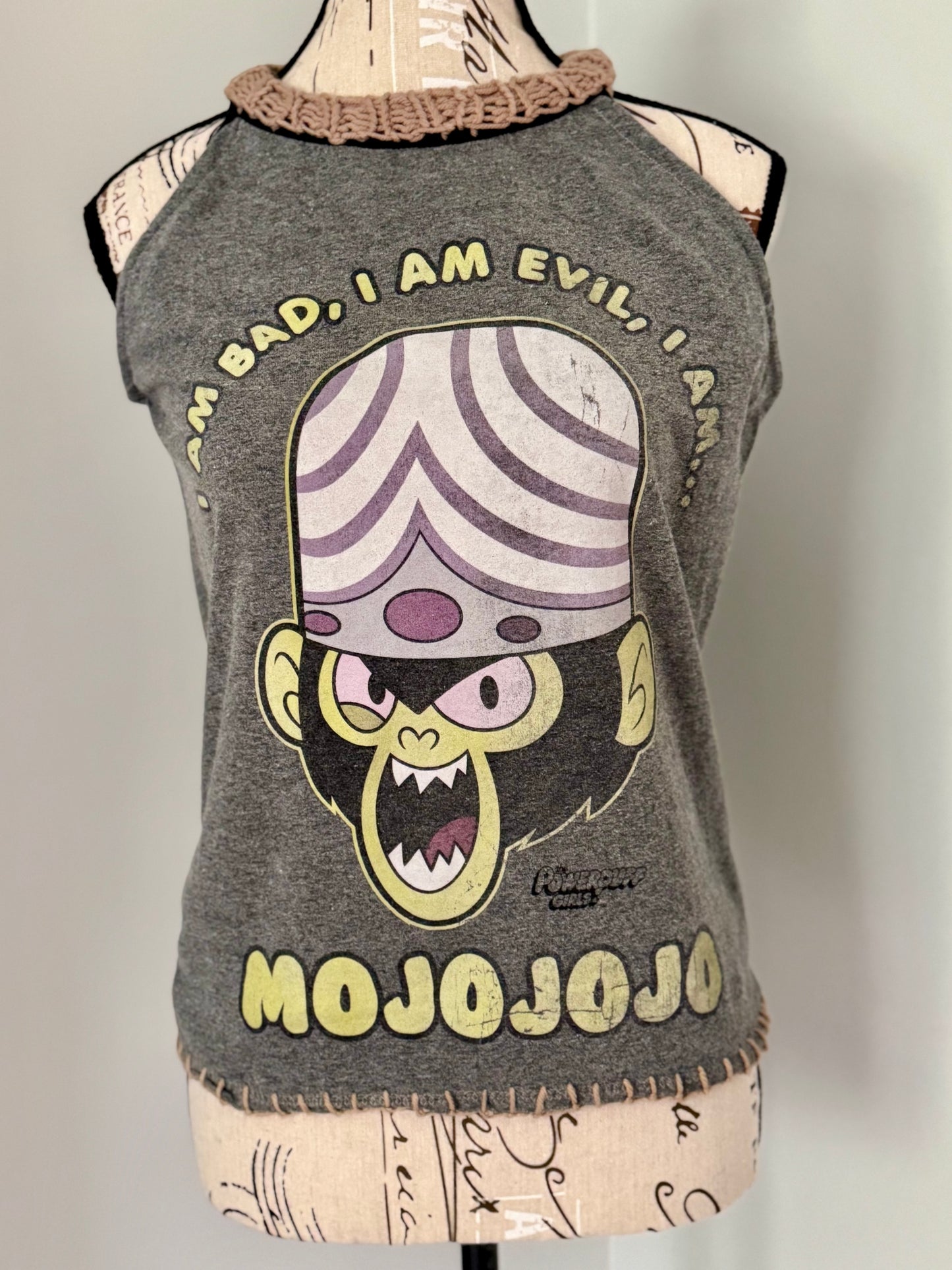 Upcycled graphic t-shirt featuring Powder Puff Girls character "MoJoJo" and trimmed with hand knitted stitch work.