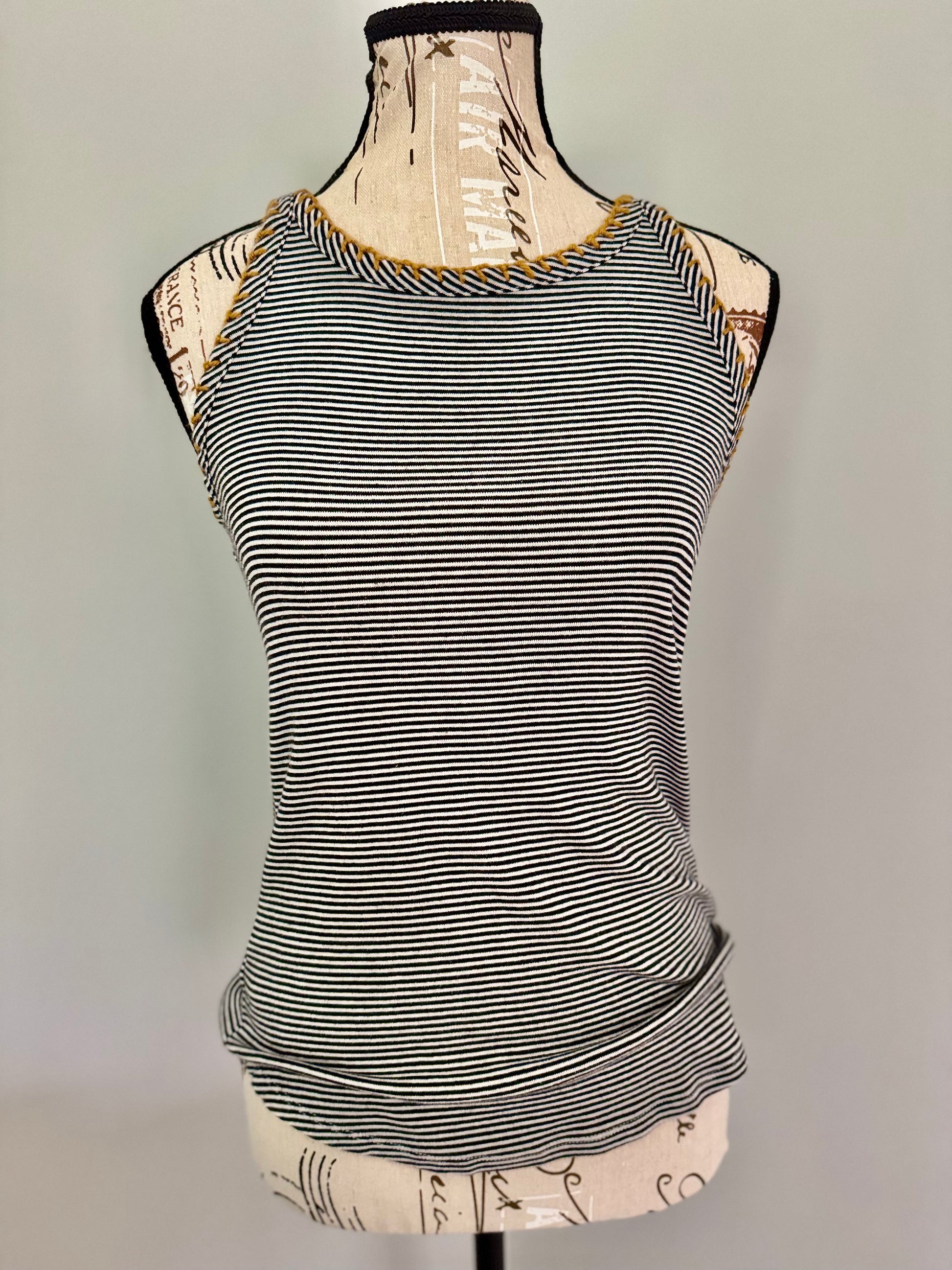 Upcycled fast fashion black and white striped tank top featuring gold hand stitched edging.