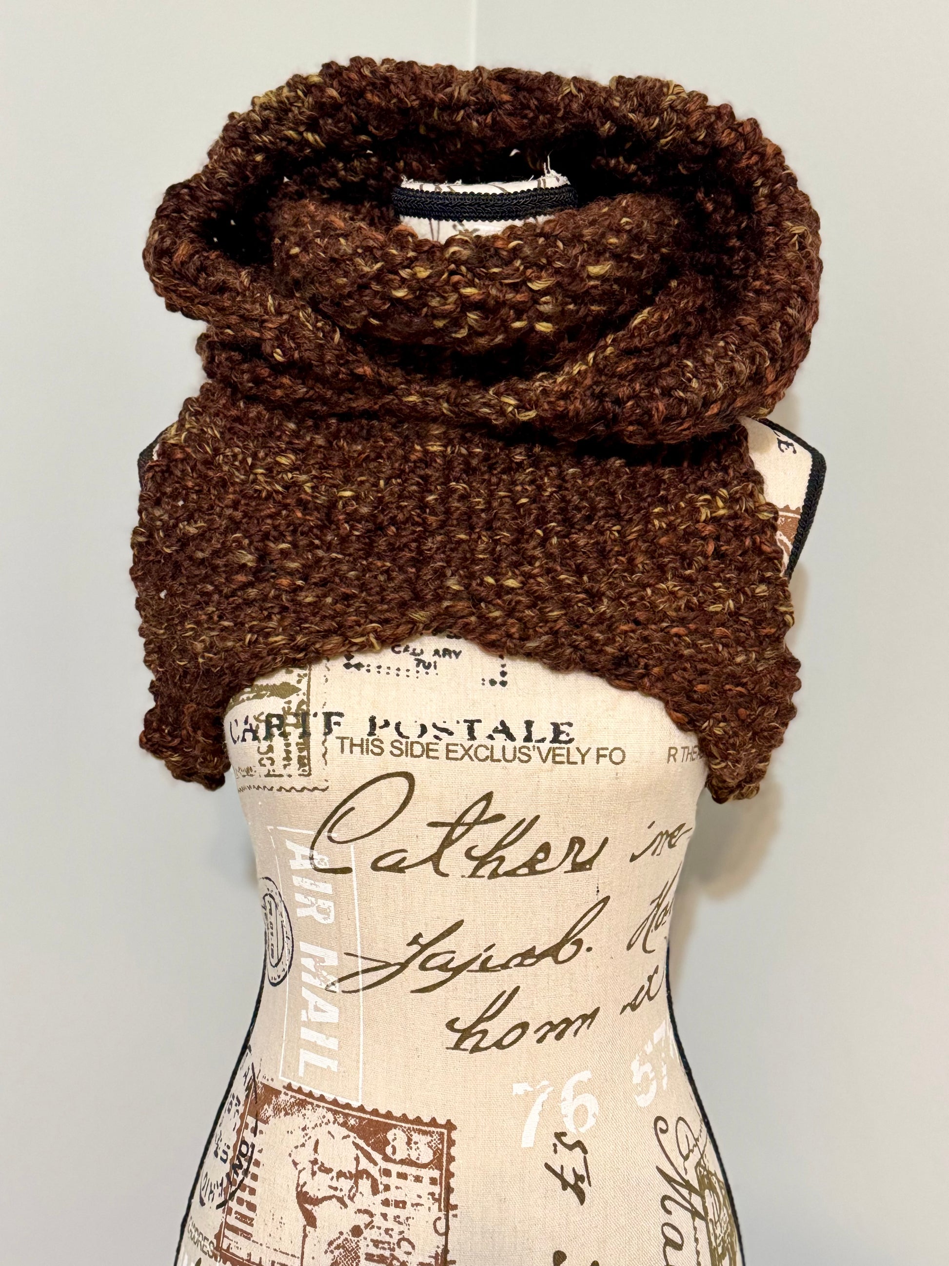 From the viral sensation this Matrix Cowl is hand knitted and features a generous hooded cowl neckline and under arm fasteners to be layered to your liking. Custom commission this piece in a color of your chosing and optionally add faux fur edging along the hood.