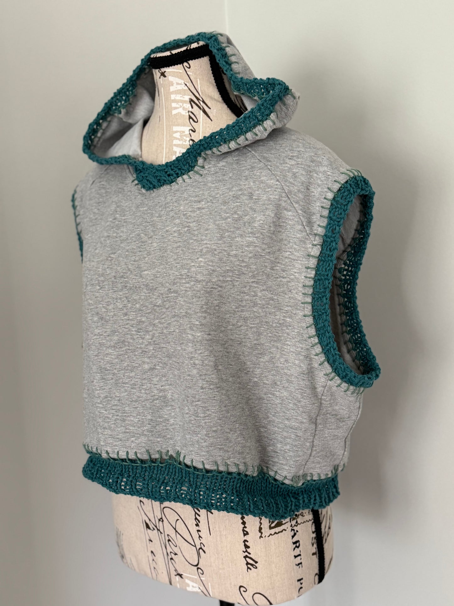 Upcycled Gray hoodie trimmed with Teal hand-knitted stitch work.