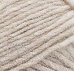 Up close image of yarn used in the structured hand-knitted beige shrug featuring seed stitch faux fur trim and prominent cuffs.
